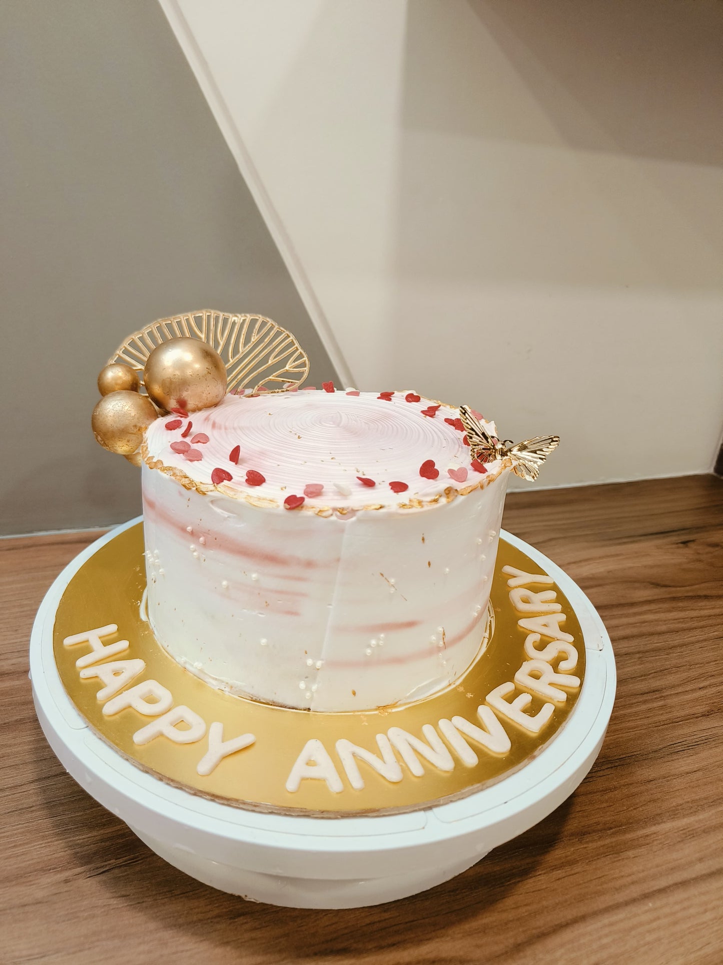 Elegant Pink and White Anniversary Cake